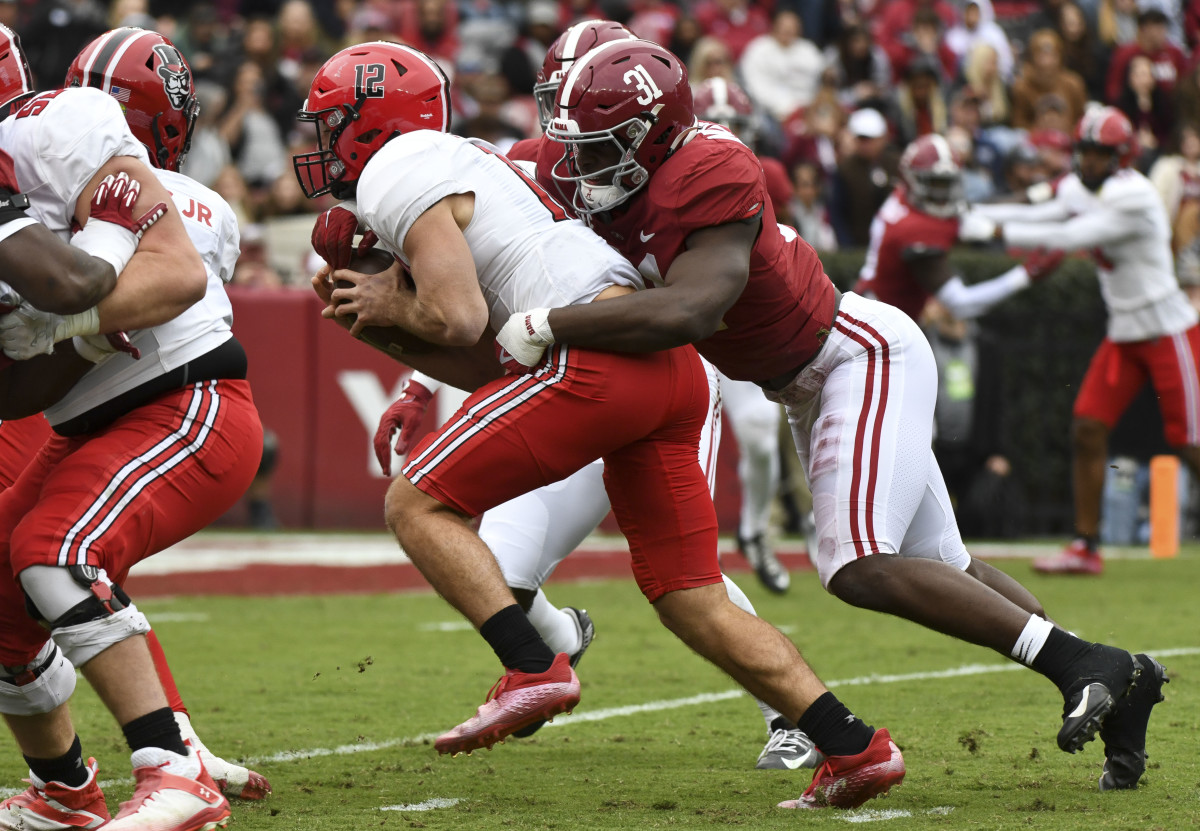 Nov 19, 2022; Tuscaloosa, Alabama, USA; Austin Peay quarterback Mike DiLiello (12) is tackled by Alabama linebacker Will Anderson Jr. (31) at Bryant-Denny Stadium.